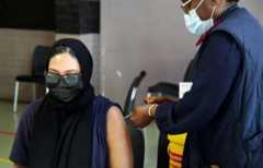 A healthcare worker administers the coronavirus disease (COVID-19) vaccine to a pregnant woman, amidst the spread of the SARS-CoV-2 variant Omicron, in Johannesburg, South Africa, on 9 December 2021