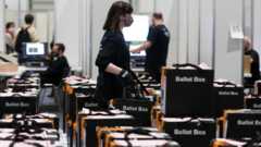 Count staff working at the election count at the ExCel Centre in London