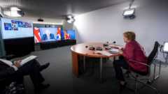 В августе Меркель и Джонсон принимали участие в виртуальном саммите "Большой семерки"