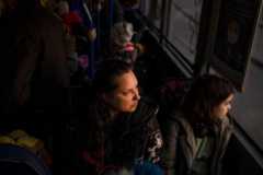 Украинские беженцы в автобусе после прохождения польской границы