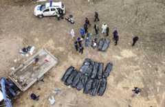 Тела, обнаруженные в общей могиле в Буче