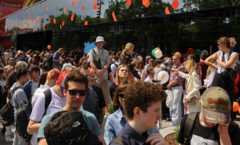 People gather near the new restaurant "Vkusno ^ tochka", which opens following McDonald's Corp company"s exit from the Russian market,
