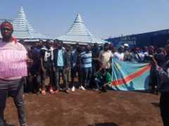 Protesters and mourners at the mass burial in Goma