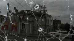 Днепр, простреленное пулями стекло