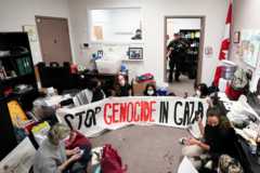 Protesters occupy an office