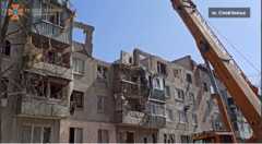 разрушенная пятиэтаэжка в Славянске