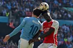 Bukayo Saka challenges Jack Grealish