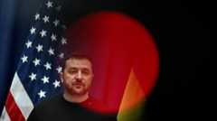 Владимир Зеленский на фоне американского флага