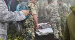 হেলিকপ্টারের ভাঙা দরজা পড়ে আছে