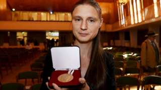 Fields Medals for Mathematics awardee Maryna Viazovska poses with her medal during the prize ceremony at the International Congress of Mathematicians 2022 (ICM 2022) in Helsinki, Finland July 5, 2022