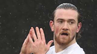 Jack Marriott applauds the Peterborough United fans