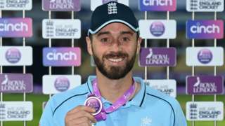 England batter James Vince holds up his medal as player of the match against Pakistan