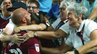 Alan Hutton celebrates his goal for Aston Villa