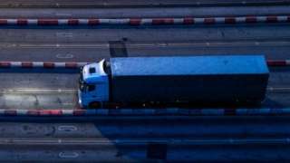 A lorry driver arrives at Dover early in the morning on 1 January 2021