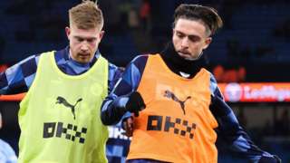 Kevin de Bruyne and Jack Grealish warm up for Manchester City