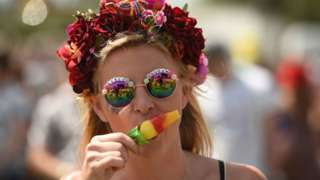 Woman with a lolly at a festival