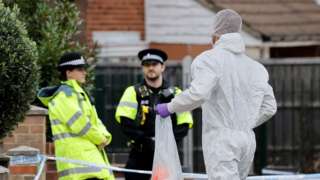 A man in a forensics suit