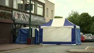 Police forensics tent on Upper High Street