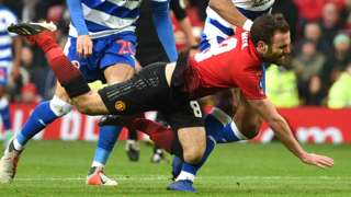 Juan Mata goes down