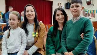 Olya Pryimak and Nataliia Dutchak with their two children