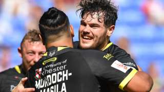 Warrington Wolves celebrate a try