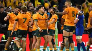 Australia celebrate victory over France