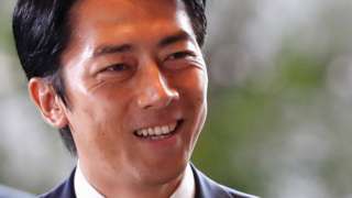 Japan's new Environment Minister Shinjiro Koizumi arrives to Prime Minister Shinzo Abe's official residence in Tokyo