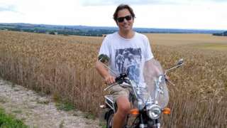 Paul Taylor on his moped