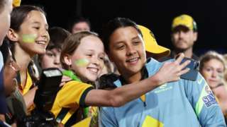 Sam Kerr takes a selfie with fans