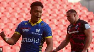 Clermont's Kotaro Matsushima celebrates, as Ben Earl looks disappointed