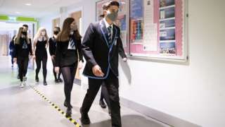 Pupils walking in corridor