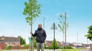 Mohammed Rafique with a tree