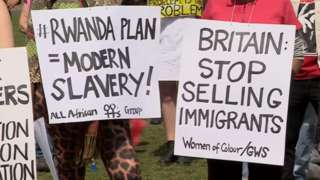 Signs at demonstration on Palace Green in Durham against Derwentside Immigration Removal Centre