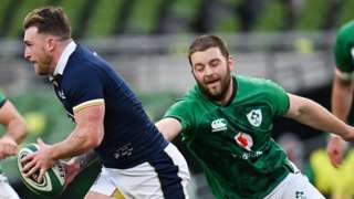 Scotland's Stuart Hogg runs with the ball against Ireland