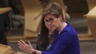 Scottish First Minister Nicola Sturgeon delivers a COVID-19 update to the Scottish Parliament on December 7, 2021