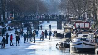 Freezing temperatures in the Netherlands have made its famous waterways ideal for outdoor skating.