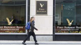 A pedestrian walks past a branch of First Republic Bank in Boston, Massachusetts, USA.