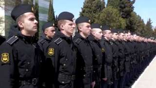 Still from video of sailors said to be crew members of the Moskva