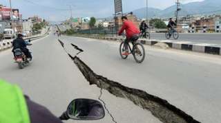 Damaged roads after an earthquake on the outskirts of Kathmandu.