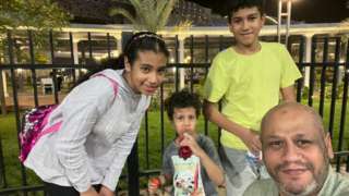Ahmed with his children