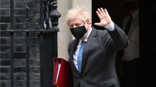 Boris Johnson leaving Downing Street for PMQs