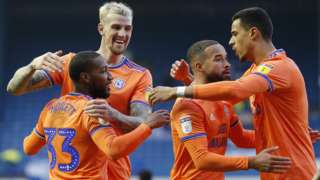 Junior Hoilett celebrates with Cardiff team mates