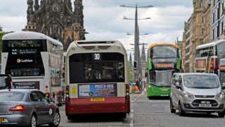 Buses and cars on Edinburgh's Princes Street