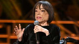 Liz Carr on stage during The Olivier Awards 2022 with MasterCard at the Royal Albert Hall on 10 April 2022 in London
