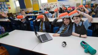 Pupils wearing VR headsets
