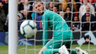 Manchester United goalkeeper David de Gea reacts after Chelsea's equaliser at Old Trafford