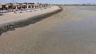 Empty sunbeds are seen during a low tide at the beach of the Red Sea resort of Sahl Hasheesh, Hurghada