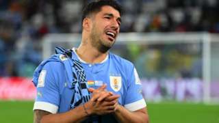 Luis Suarez reacts to Uruguay's elimination from the World Cup
