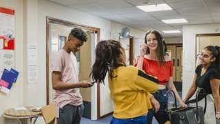 Students laugh and joke