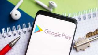 Google Play logo in phone